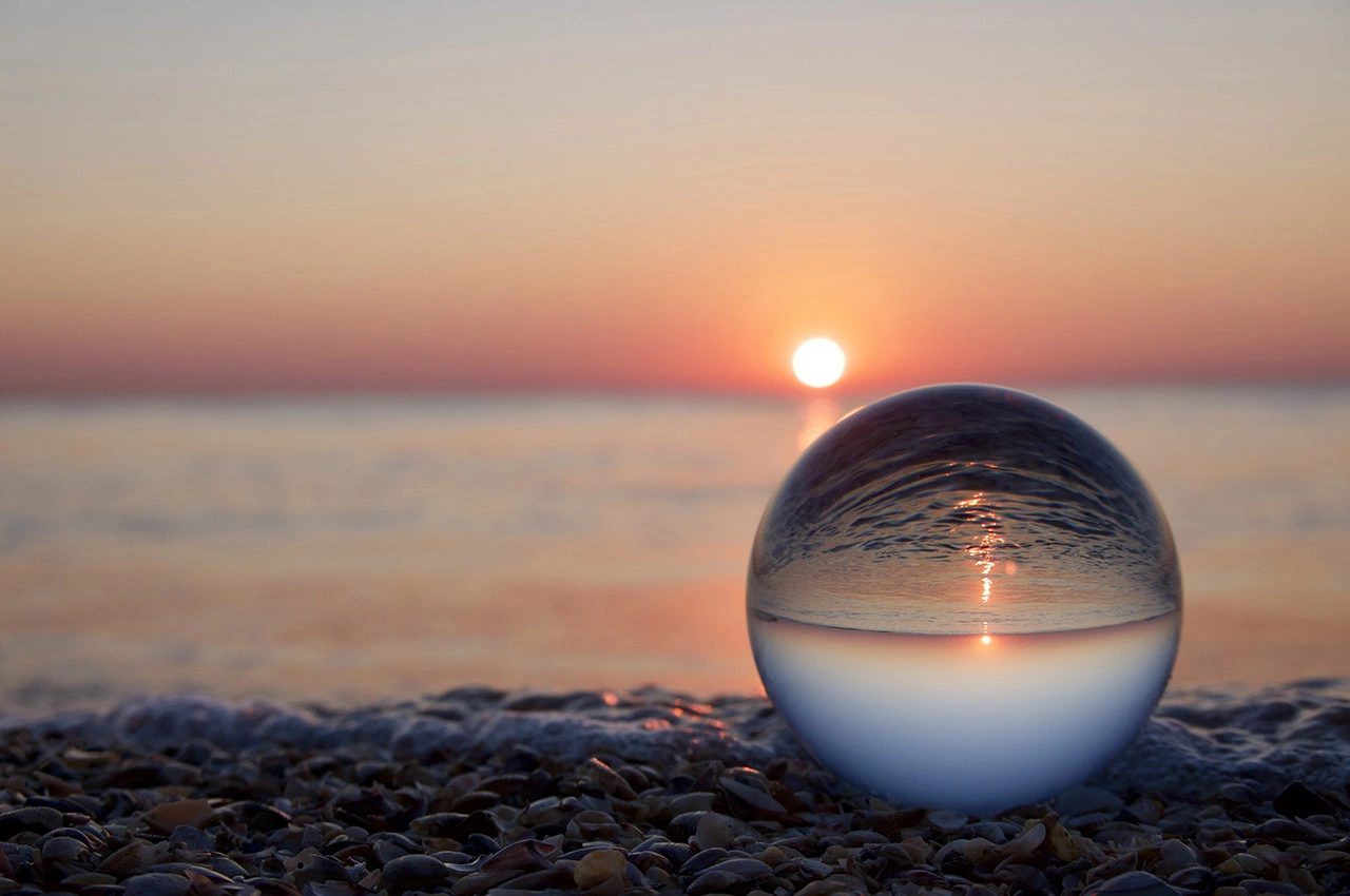 crystal ball at beach during dawn